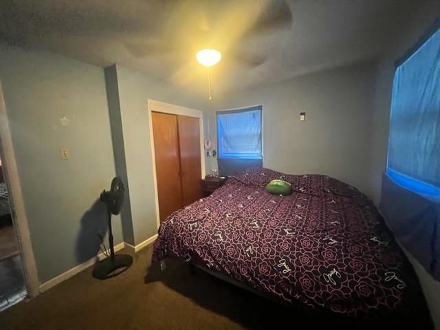4606 Macon Road Memphis, TN 38122 - Photo 9 of 12 a bedroom with a bed and a dresser