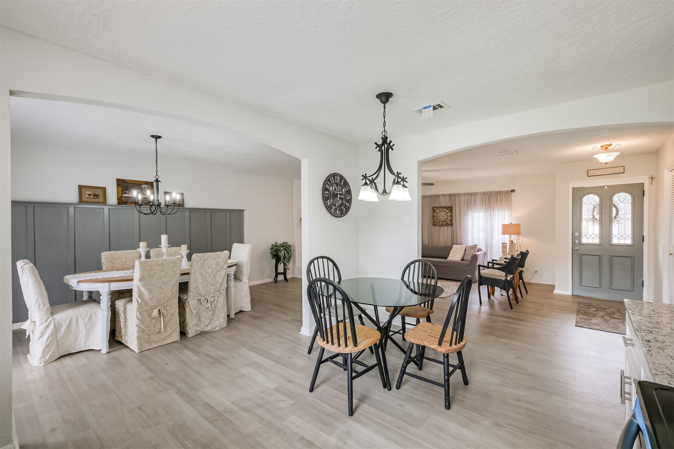 2705 Parrott Avenue Rosenberg, TX 77471 - Photo 12 of 37 a view of a dining room with furniture and wooden floor
