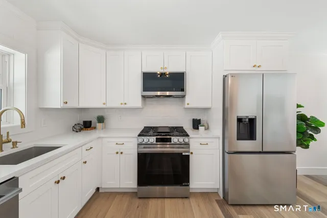 $399,900 | 563 Pearl Harbor Street, Bridgeport, CT 06610