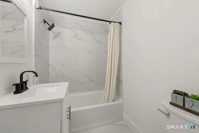 $399,900 | 563 Pearl Harbor Street, Bridgeport, CT 06610