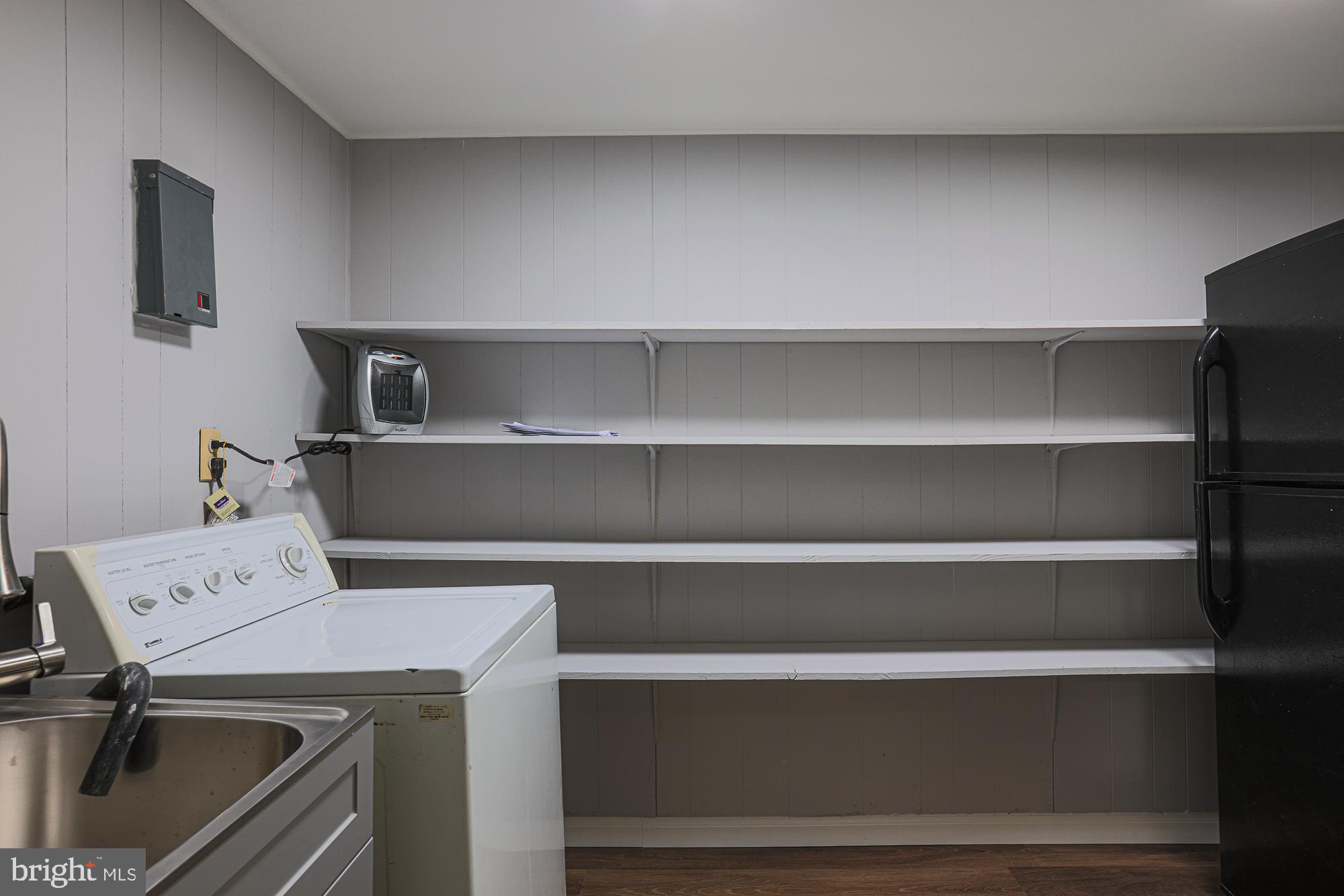2507 Taney Road Baltimore, MD 21209 - Photo 14 of 58 a view of utility room with washer and dryer