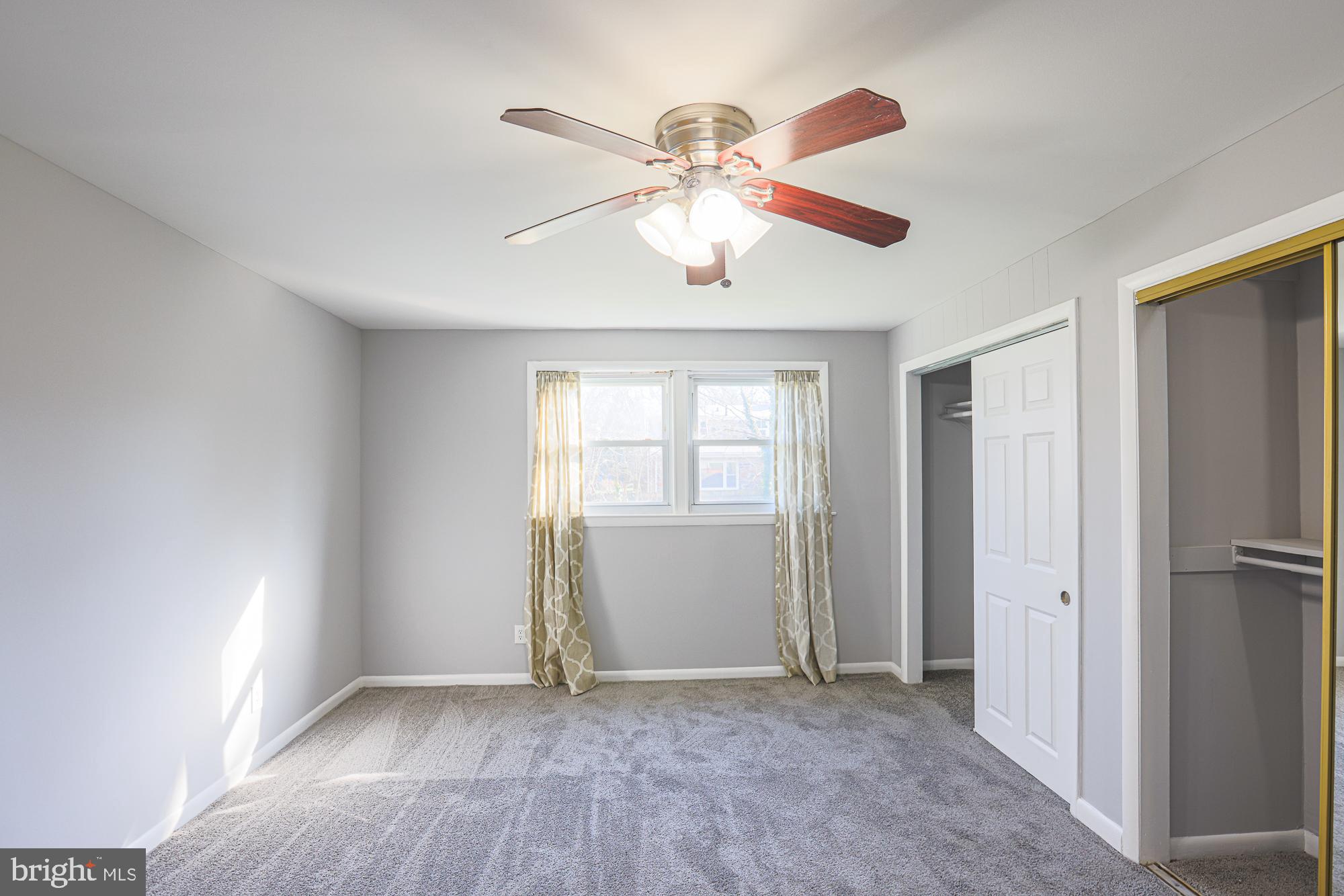 2507 Taney Road Baltimore, MD 21209 - Photo 31 of 58 a view of an empty room with a window