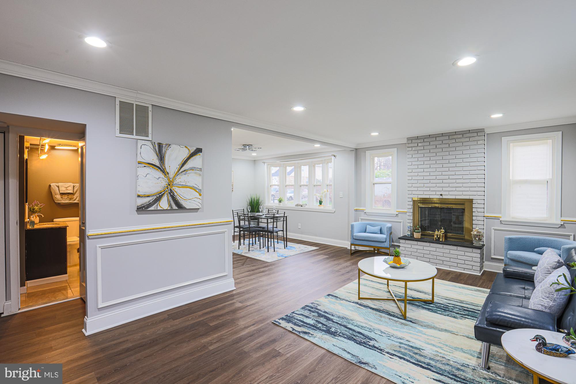 2507 Taney Road Baltimore, MD 21209 - Photo 36 of 58 a living room with furniture and a wooden floor