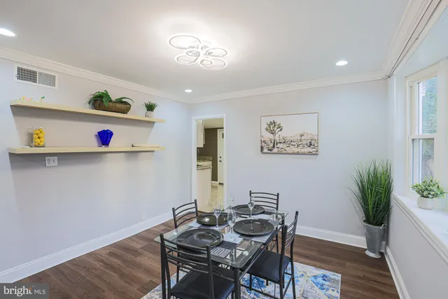 a room with furniture and wooden floor