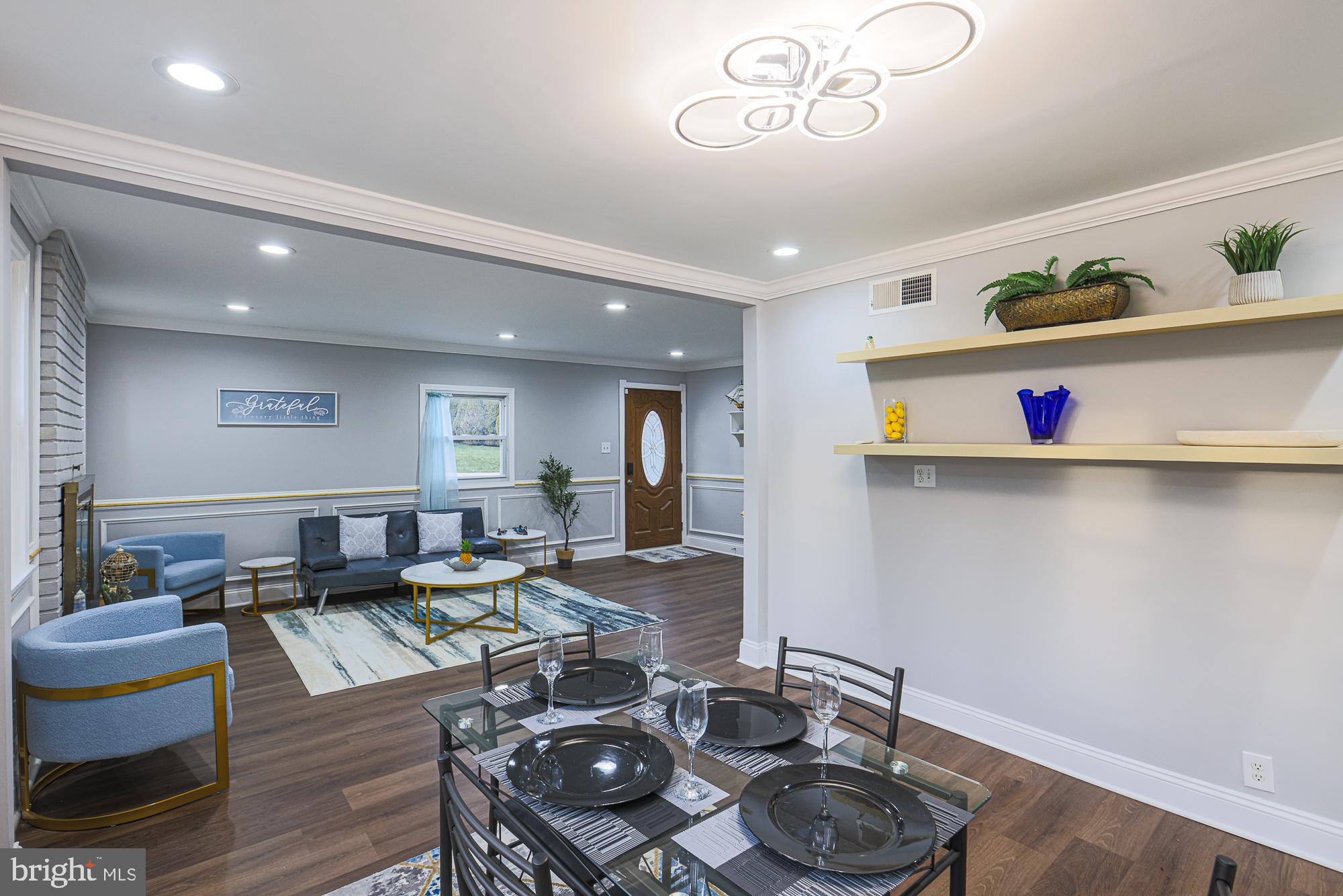 2507 Taney Road Baltimore, MD 21209 - Photo 47 of 58 a living room with furniture and wooden floor