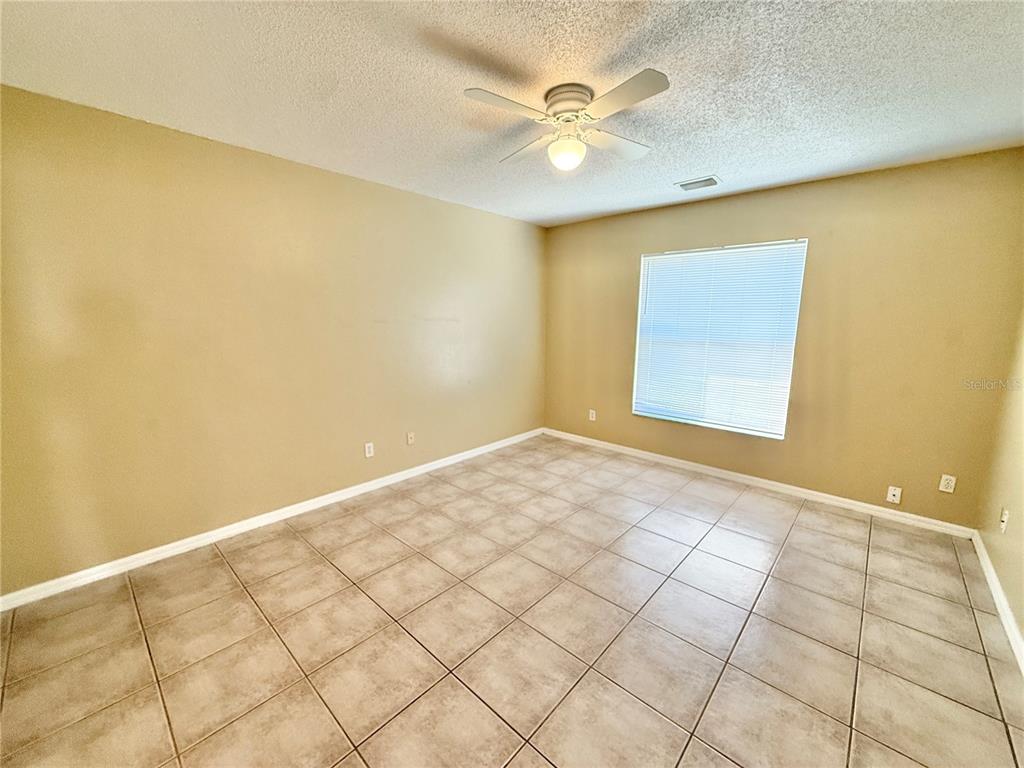 4695 Prairie Point Boulevard Kissimmee, FL 34746 - Photo 11 of 27 a view of an empty room