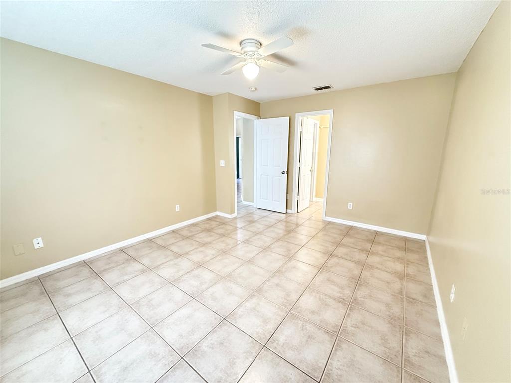 4695 Prairie Point Boulevard Kissimmee, FL 34746 - Photo 12 of 27 a view of an empty room