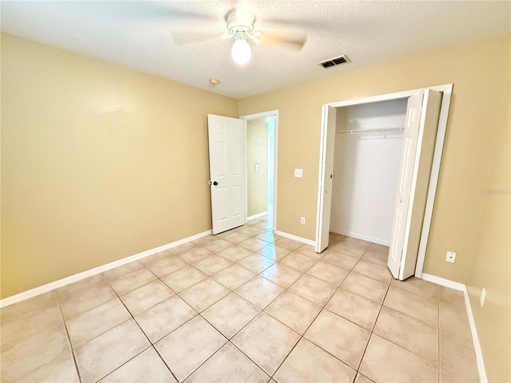 4695 Prairie Point Boulevard Kissimmee, FL 34746 - Photo 18 of 27 a view of an empty room