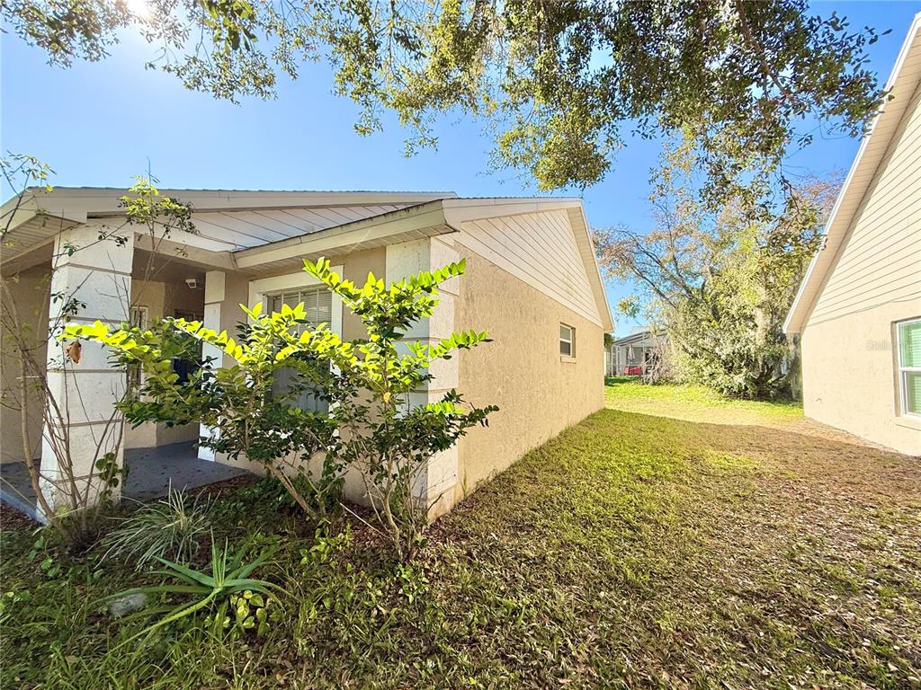 4695 Prairie Point Boulevard Kissimmee, FL 34746 - Photo 23 of 27 a view of a garden with plants