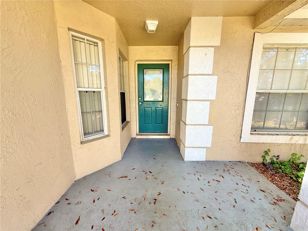 4695 Prairie Point Boulevard Kissimmee, FL 34746 - Photo 3 of 27 a view of a bedroom with a window