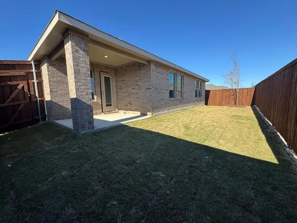 a view of backyard of house