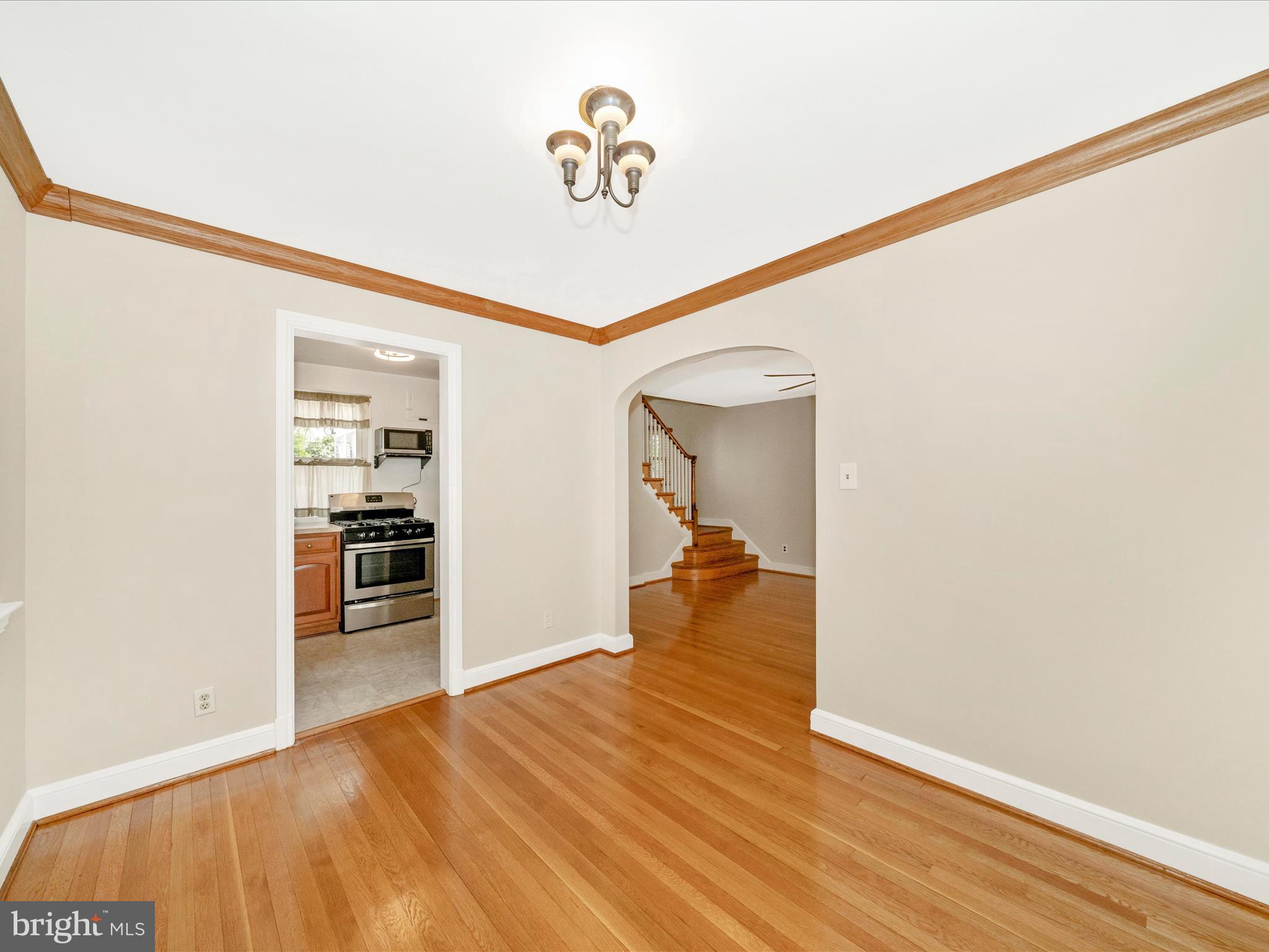 9405 Flower Avenue Silver Spring, MD 20901 - Photo 11 of 51 a view of a room with wooden floor