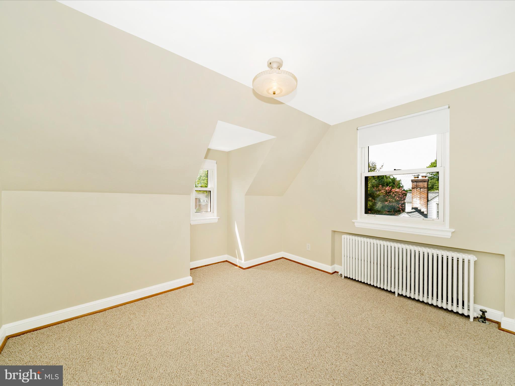 9405 Flower Avenue Silver Spring, MD 20901 - Photo 23 of 51 an empty room with windows