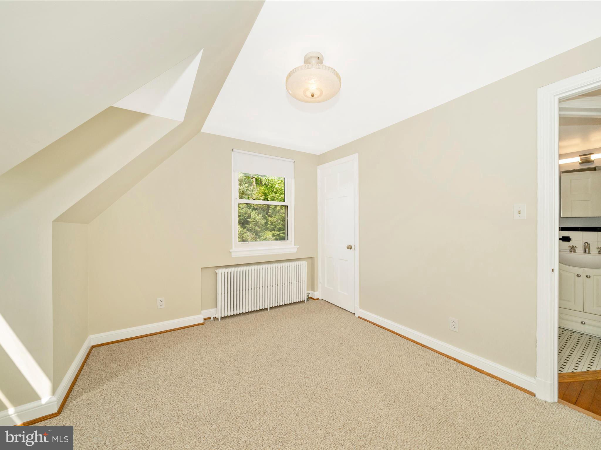 9405 Flower Avenue Silver Spring, MD 20901 - Photo 24 of 51 an empty room with windows