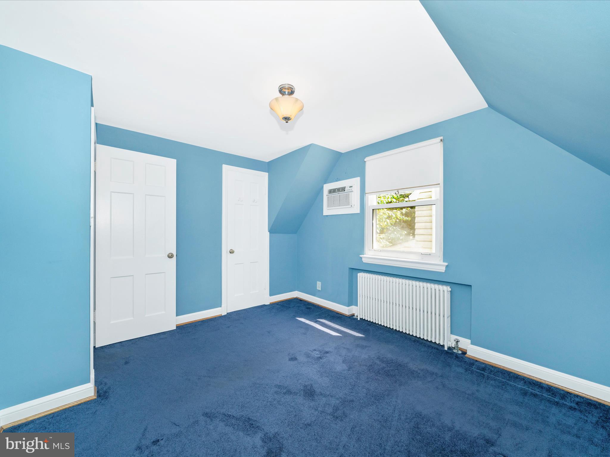 9405 Flower Avenue Silver Spring, MD 20901 - Photo 29 of 51 an empty room with windows
