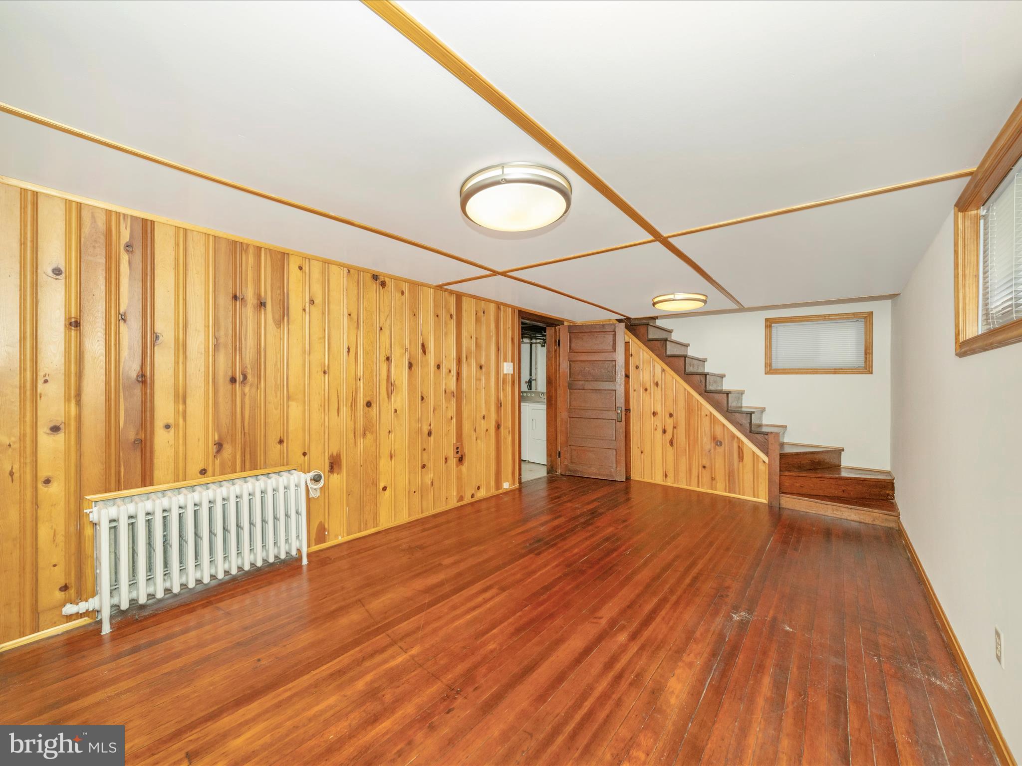 9405 Flower Avenue Silver Spring, MD 20901 - Photo 32 of 51 a view of entryway with wooden floor
