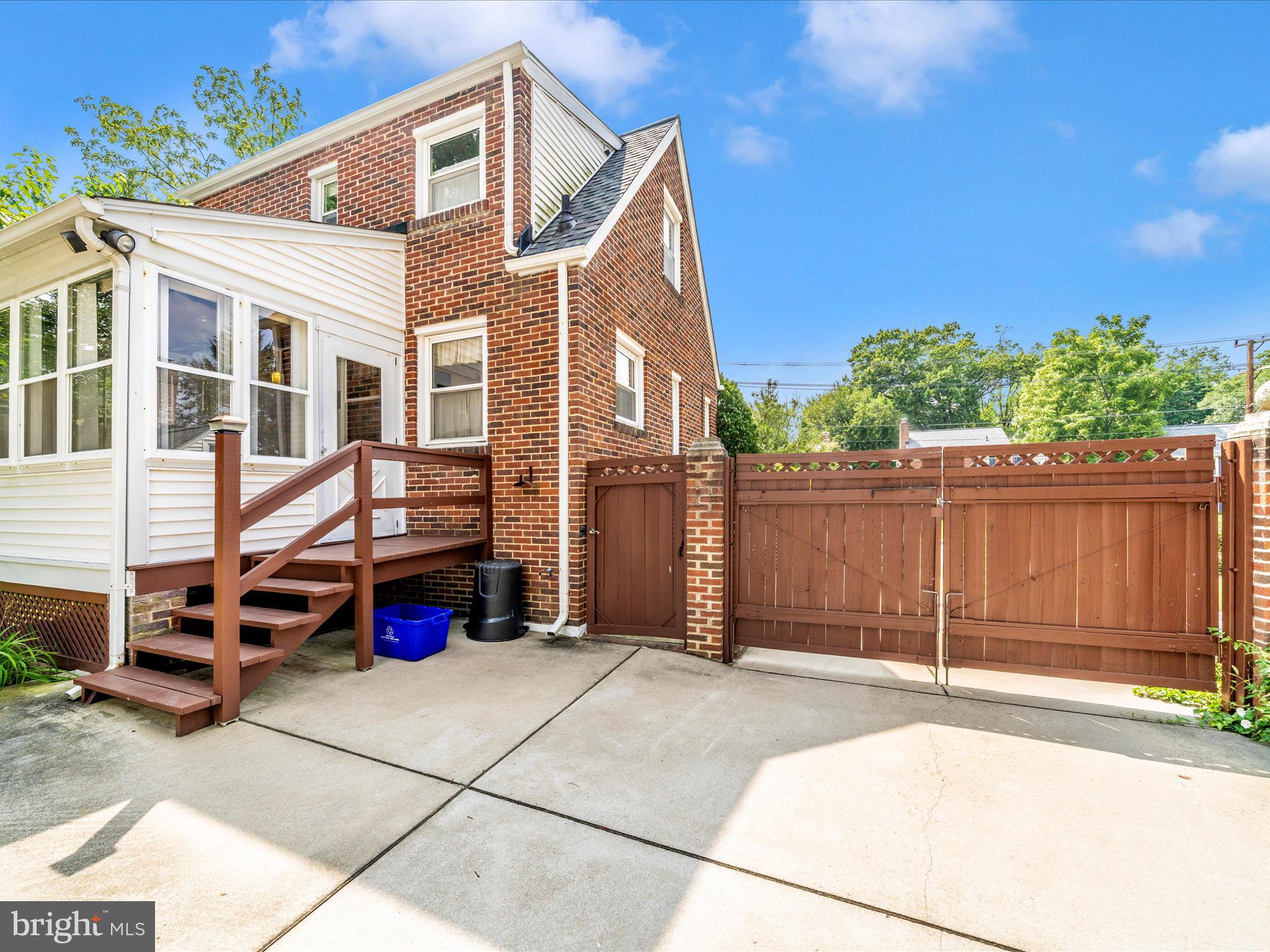 9405 Flower Avenue Silver Spring, MD 20901 - Photo 47 of 51 a view of a house with a backyard