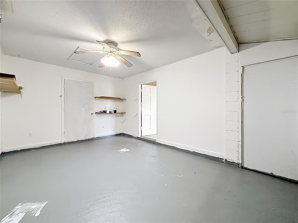 3 Bahia Pl Loop Ocala, FL 34472 - Photo 18 of 31 a view of a livingroom with a ceiling fan and window
