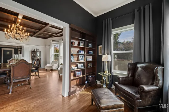 a large kitchen with stainless steel appliances lots of counter space and windows