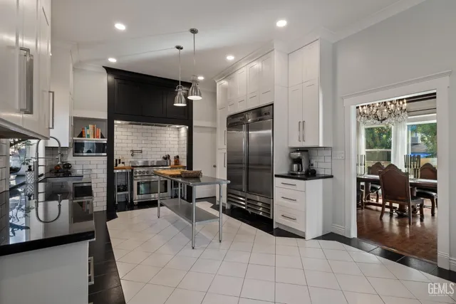 a view of entryway with furniture and wooden floor