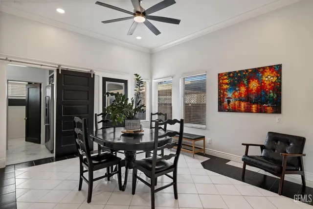 a kitchen with a window a sink and cabinets