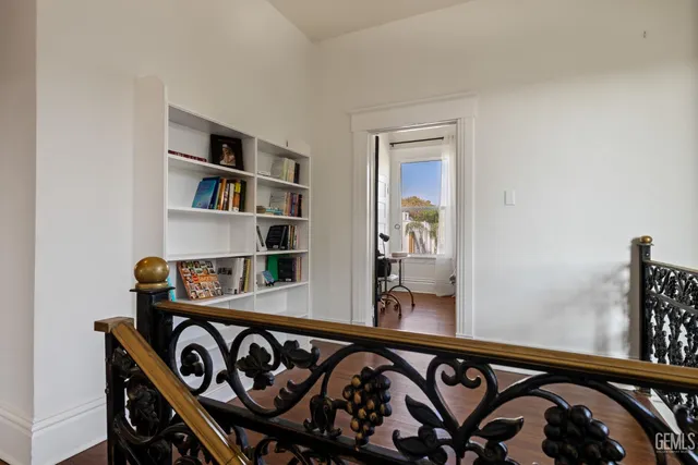 a view of a house with a yard and a garden