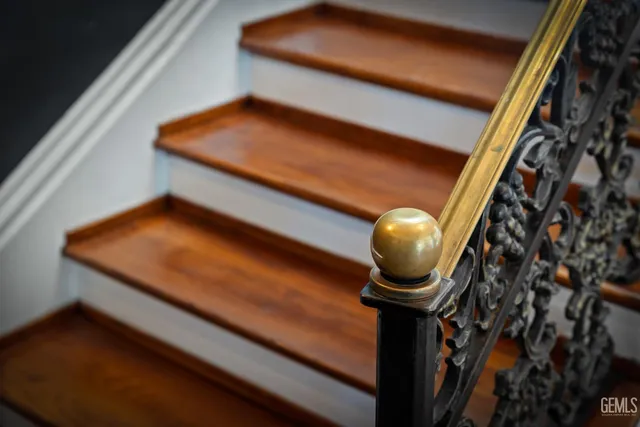 a view of a patio with a table and chairs