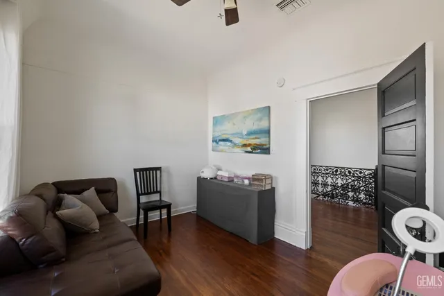a front view of a house with a yard table and chairs
