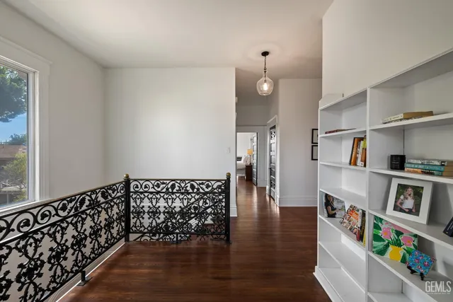 a view of a park with bench and a fire pit