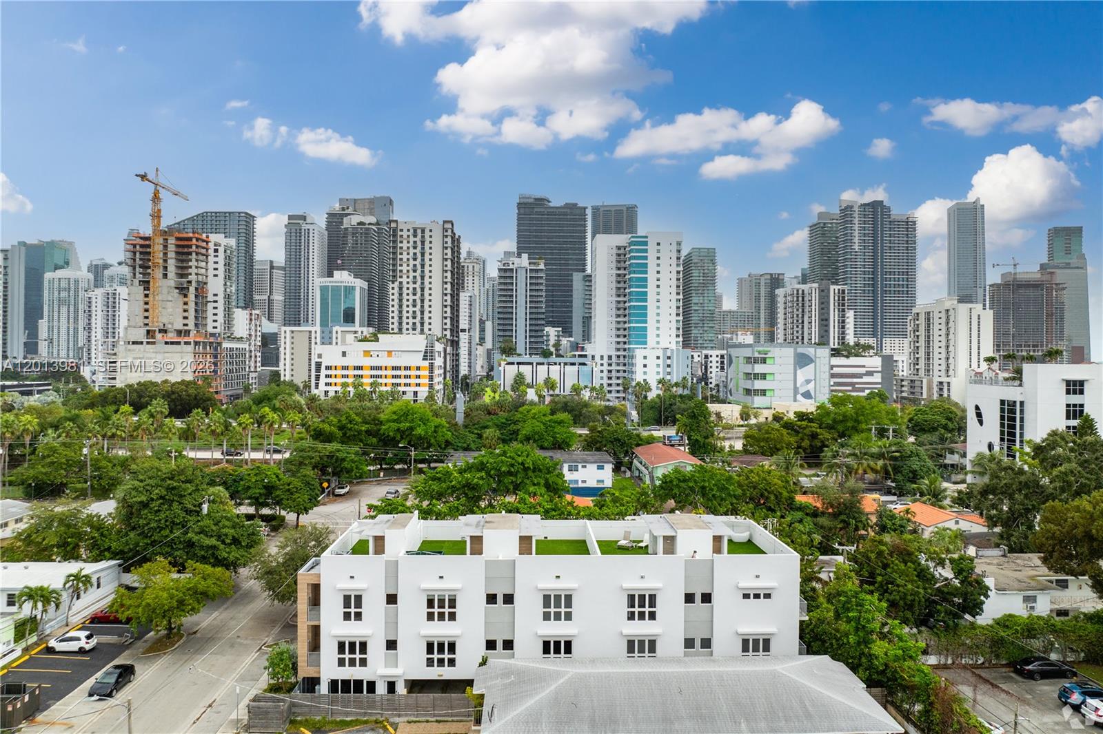 434 Southwest 10th Street, Unit A Miami, FL 33130 - Photo 20 of 23 a picture of houses with outdoor space