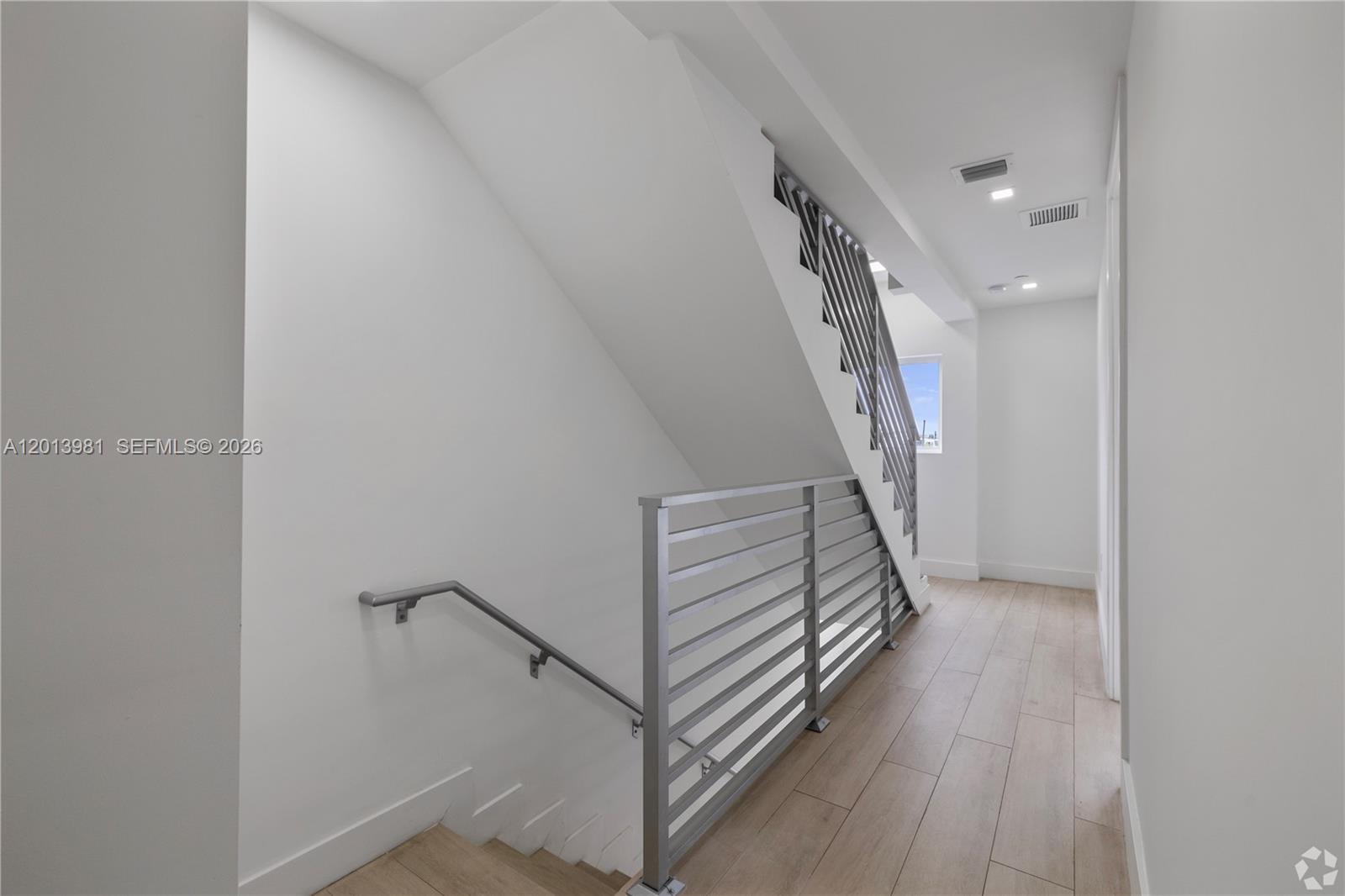 434 Southwest 10th Street, Unit A Miami, FL 33130 - Photo 10 of 23 a view of entryway and hall with wooden floor