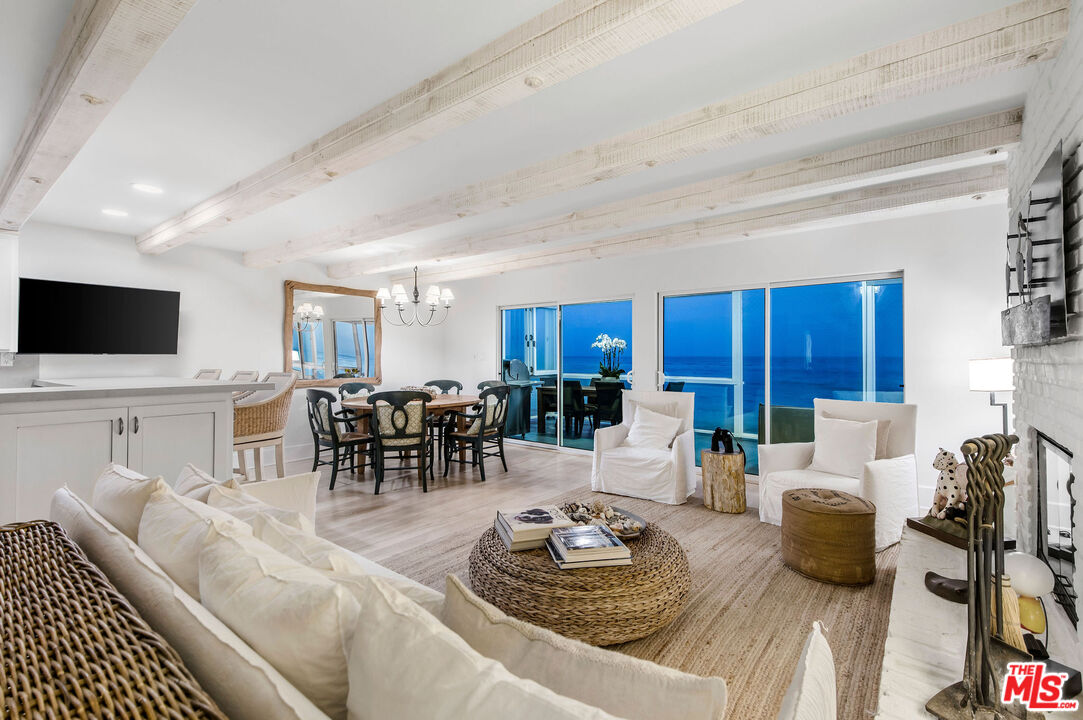 31640 Sea Level Drive Malibu, CA 90265 - Photo 2 of 41 a living room with furniture and a flat screen tv