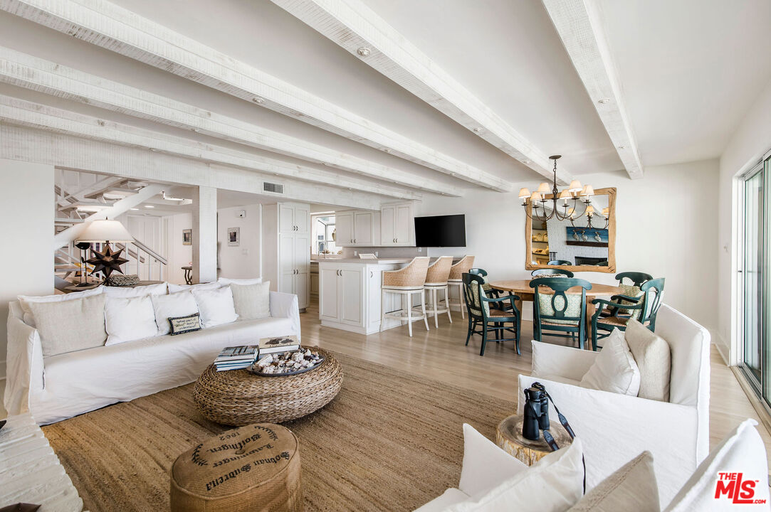 31640 Sea Level Drive Malibu, CA 90265 - Photo 4 of 41 a living room with furniture and view of kitchen