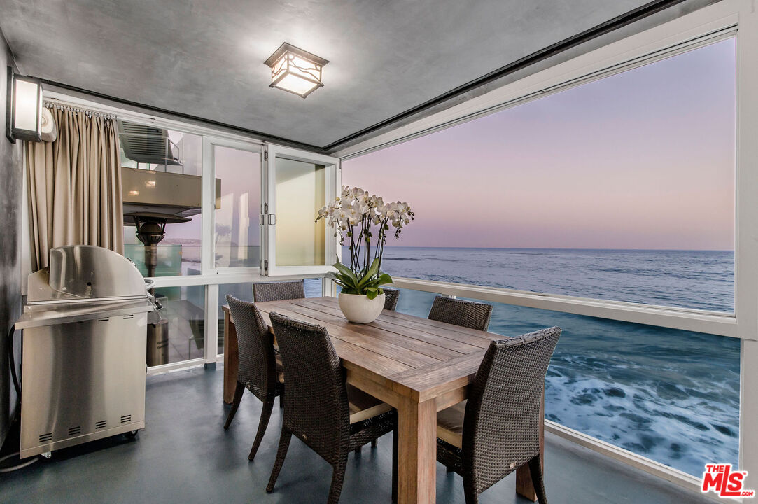 31640 Sea Level Drive Malibu, CA 90265 - Photo 9 of 41 a view of a dining room with furniture