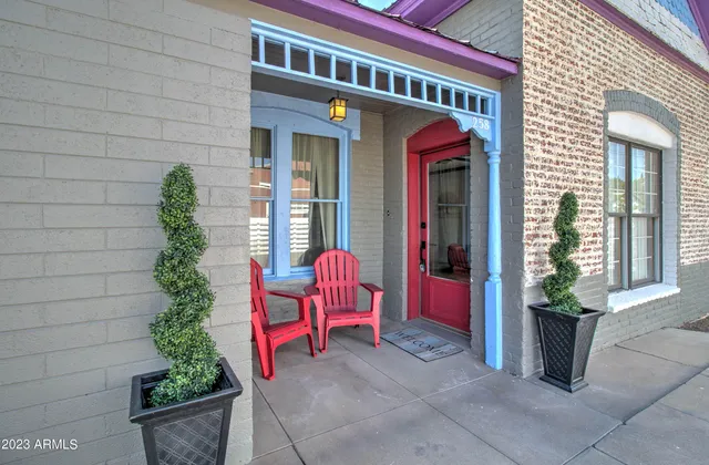 a view of a house with a potted plants