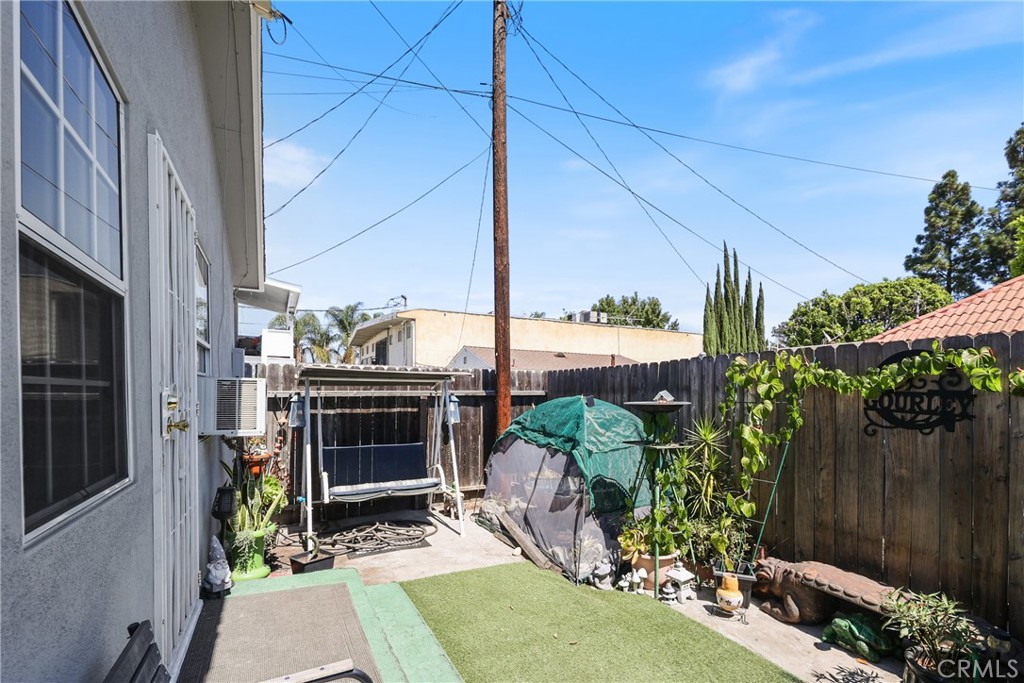 15323 Paramount Boulevard Paramount, CA 90723 - Photo 55 of 72 15329 1/2 Paramount Blvd: 1 BR/1 BA Unit behind home / Yard