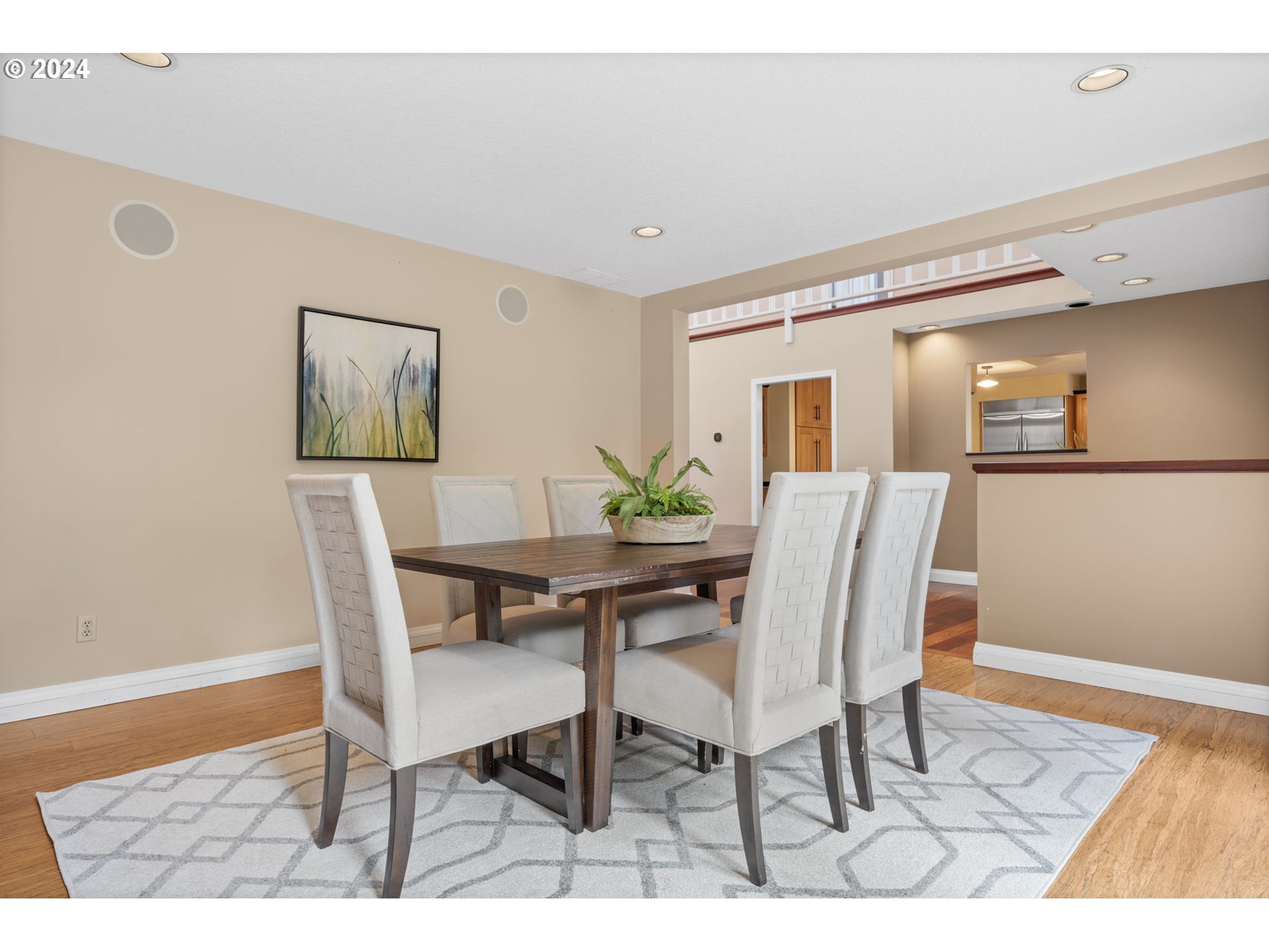 4803 Southwest Stonebrook Court Portland, OR 97239 - Photo 18 of 40 a view of a dining room with furniture and wooden floor