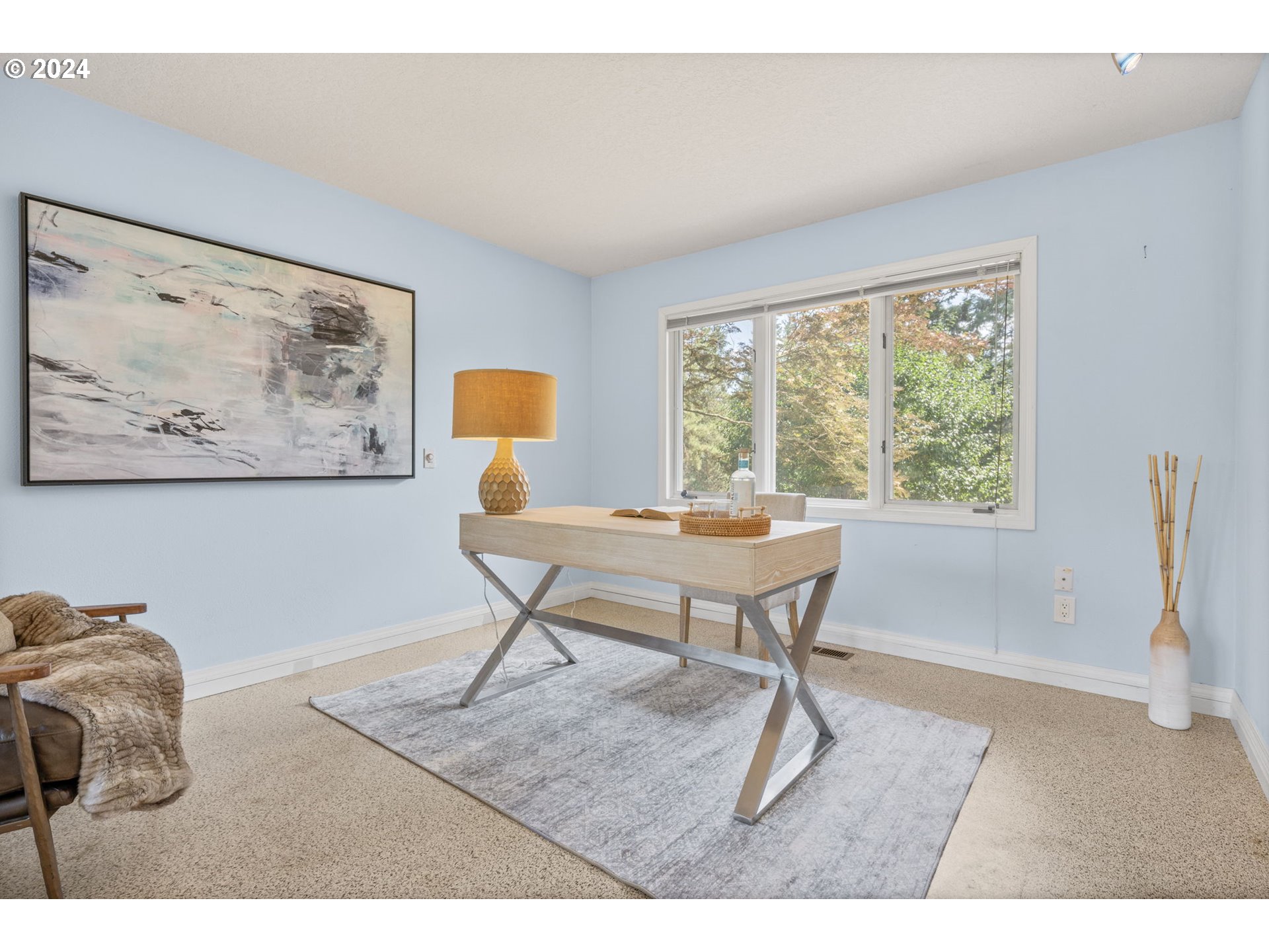 4803 Southwest Stonebrook Court Portland, OR 97239 - Photo 19 of 40 a workspace with furniture and a window