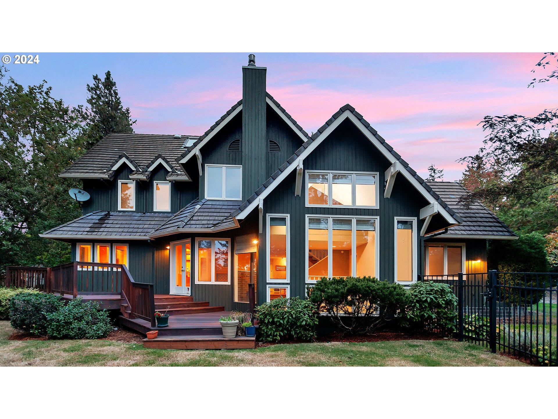 4803 Southwest Stonebrook Court Portland, OR 97239 - Photo 2 of 40 a front view of a house with garden