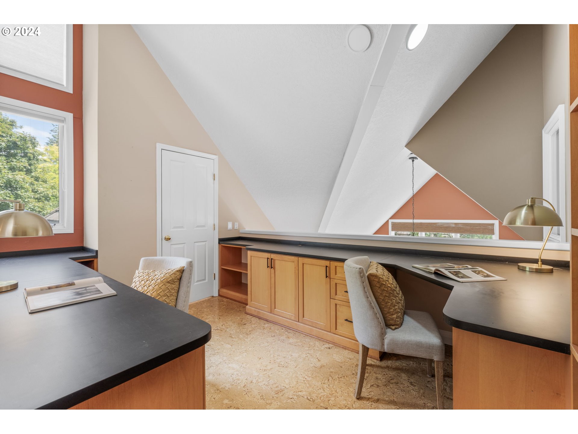 4803 Southwest Stonebrook Court Portland, OR 97239 - Photo 21 of 40 a living room with chair and a table