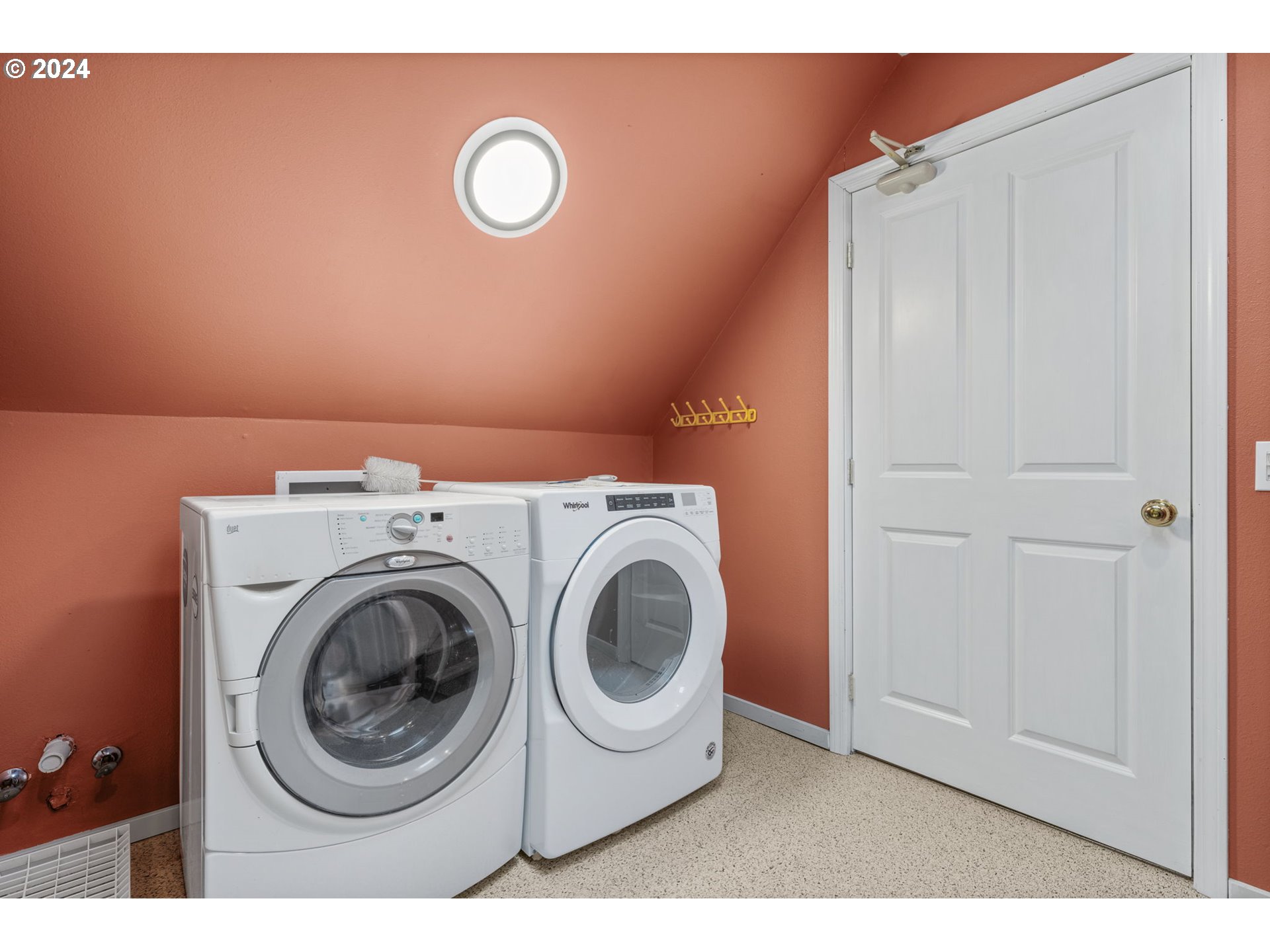 4803 Southwest Stonebrook Court Portland, OR 97239 - Photo 28 of 40 a utility room with dryer and washer