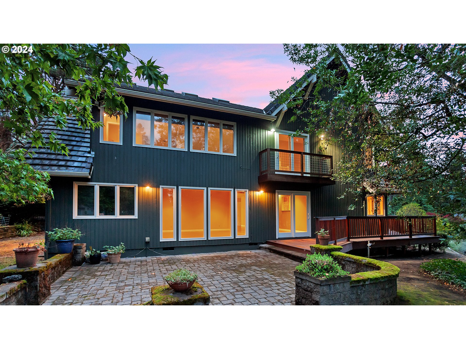 4803 Southwest Stonebrook Court Portland, OR 97239 - Photo 3 of 40 a house view with a garden space