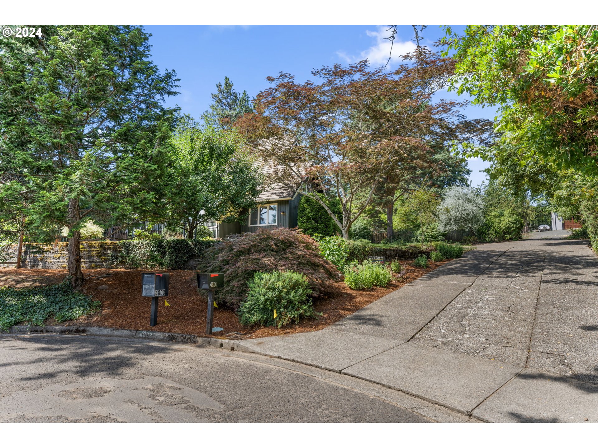 4803 Southwest Stonebrook Court Portland, OR 97239 - Photo 36 of 40 a view of a backyard