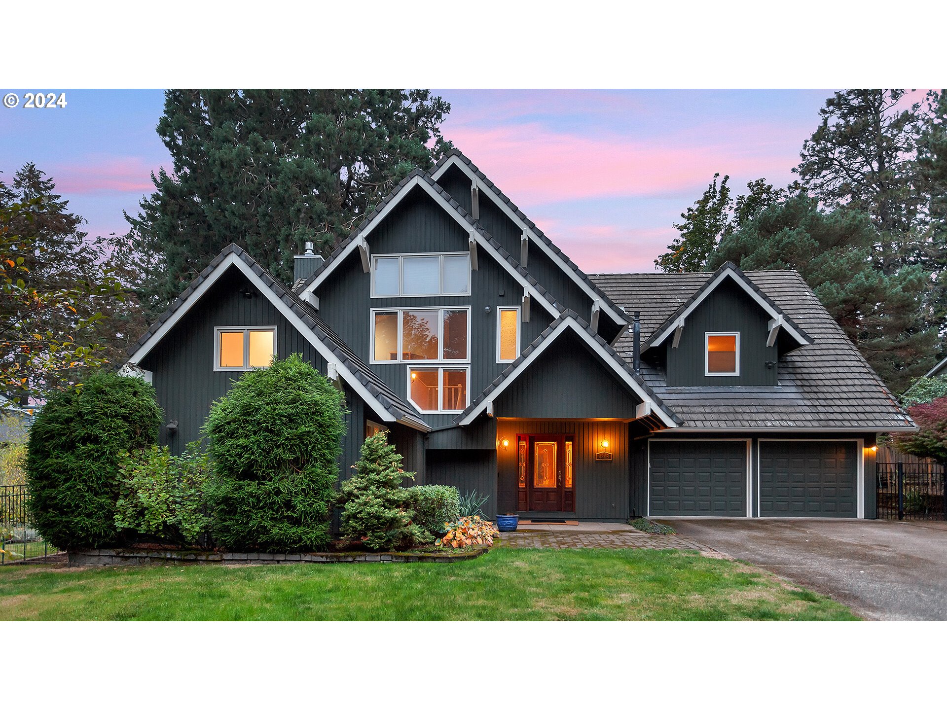 4803 Southwest Stonebrook Court Portland, OR 97239 - Photo 4 of 40 a house view with a garden space