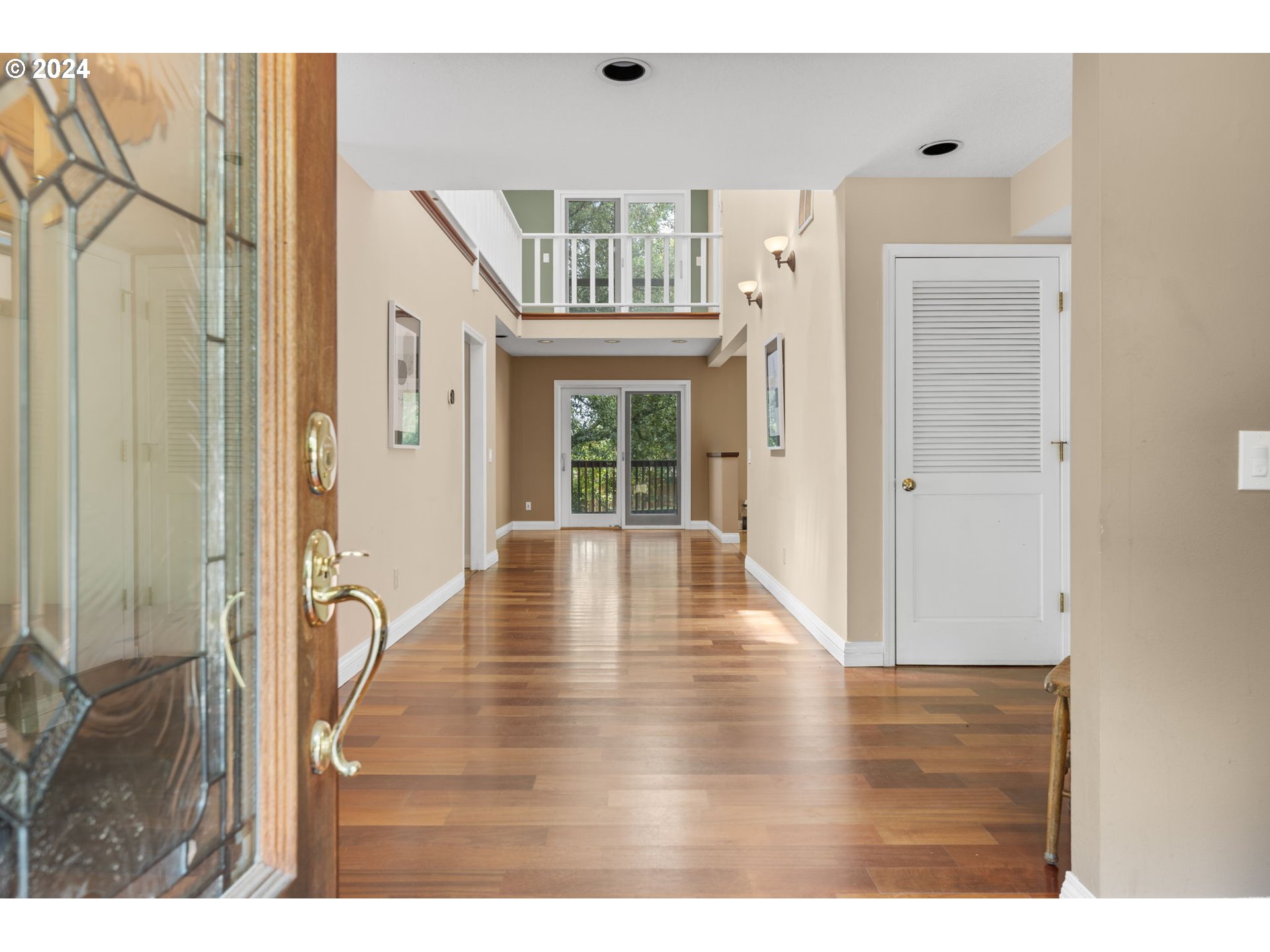 4803 Southwest Stonebrook Court Portland, OR 97239 - Photo 5 of 40 a view of an entryway with wooden floor