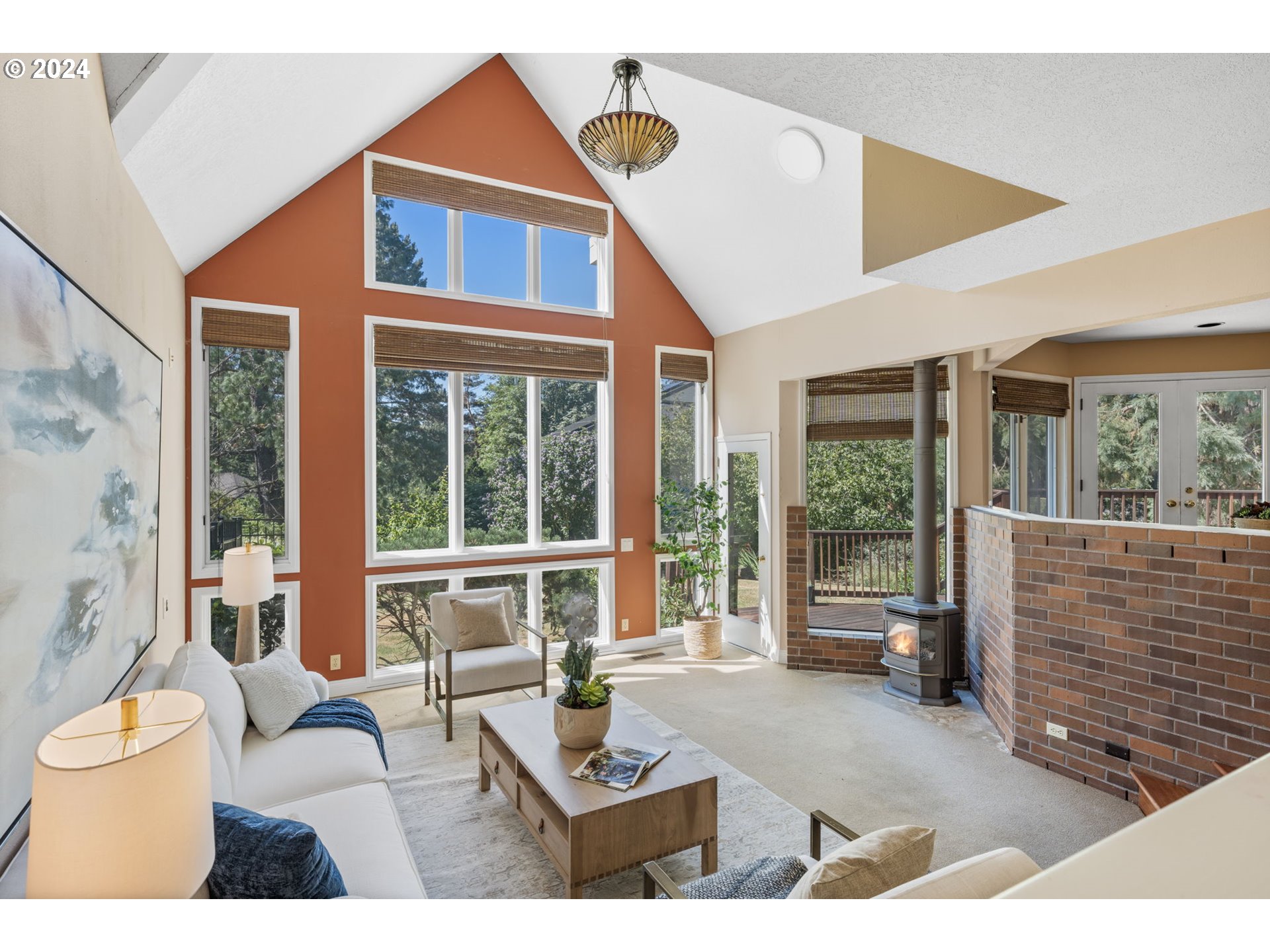 4803 Southwest Stonebrook Court Portland, OR 97239 - Photo 10 of 40 a living room with furniture and a window
