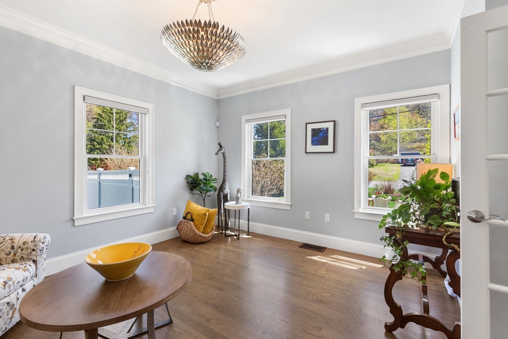 24 Pine Knoll Road Lexington, MA 02420 - Photo 13 of 41 a living room with furniture and a potted plant