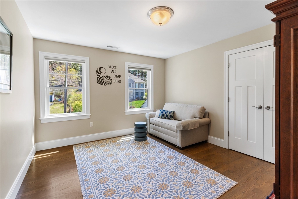 24 Pine Knoll Road Lexington, MA 02420 - Photo 23 of 41 a living room with furniture and a window