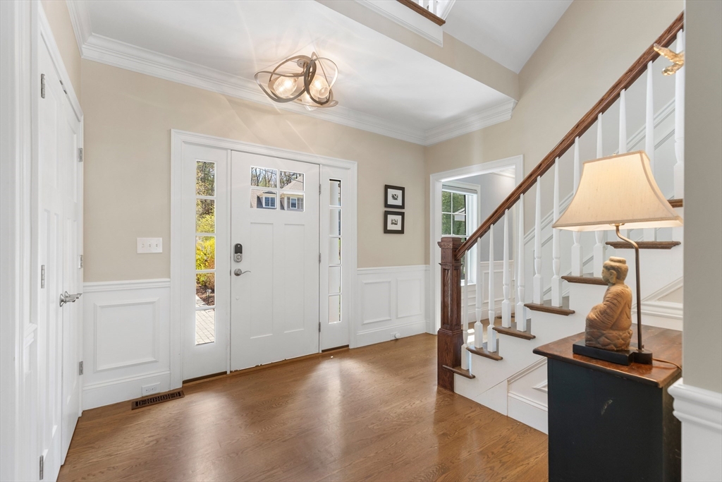 24 Pine Knoll Road Lexington, MA 02420 - Photo 3 of 41 a view of entryway with wooden floor and stairs