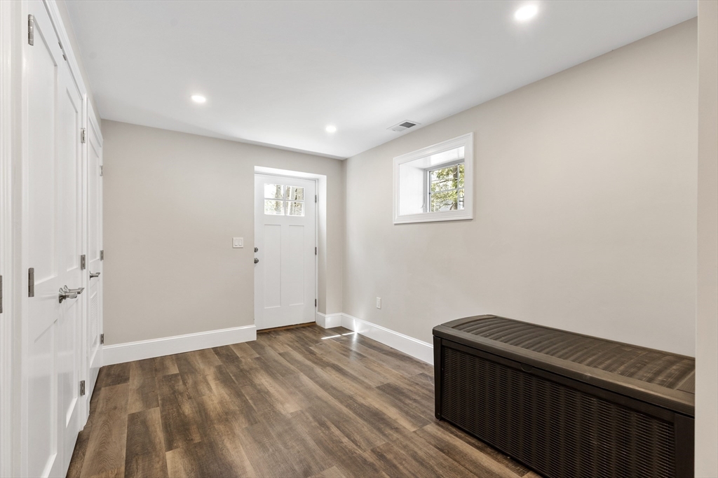 24 Pine Knoll Road Lexington, MA 02420 - Photo 35 of 41 a view of room with wooden floor